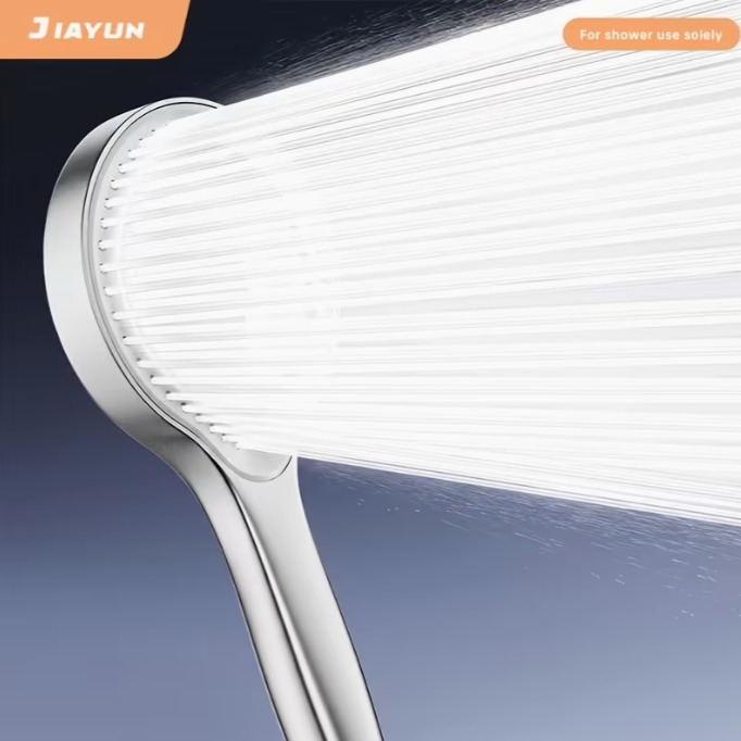Wide-panel handheld shower head with multiple spray nozzles